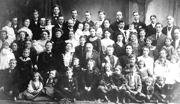 Joseph F. Smith with his wives and children